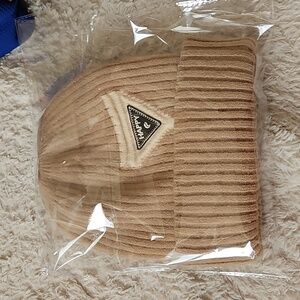 Brand new tan happy beanie